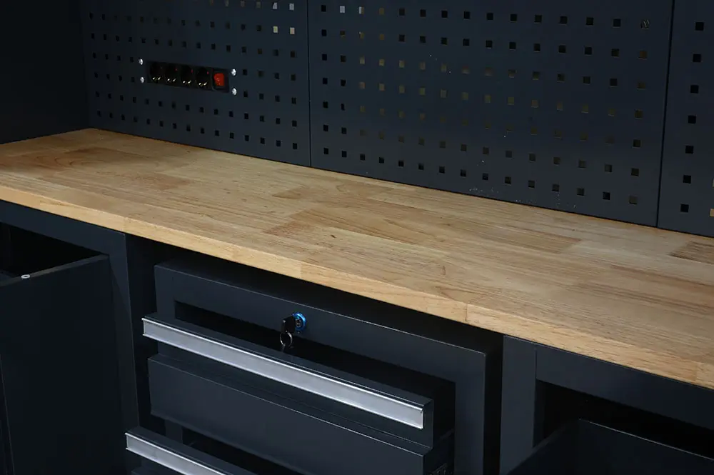 Wood worktop and perforated pegboard detail on the garage cabinet set